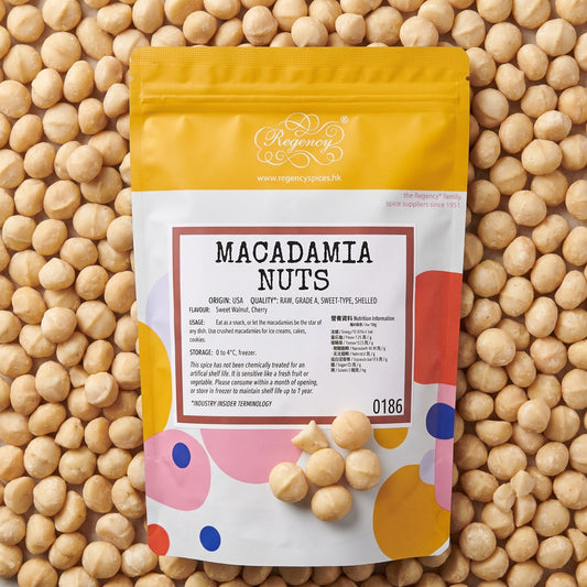 Macadamia Nuts Regency packaging on bed of macadamia nuts