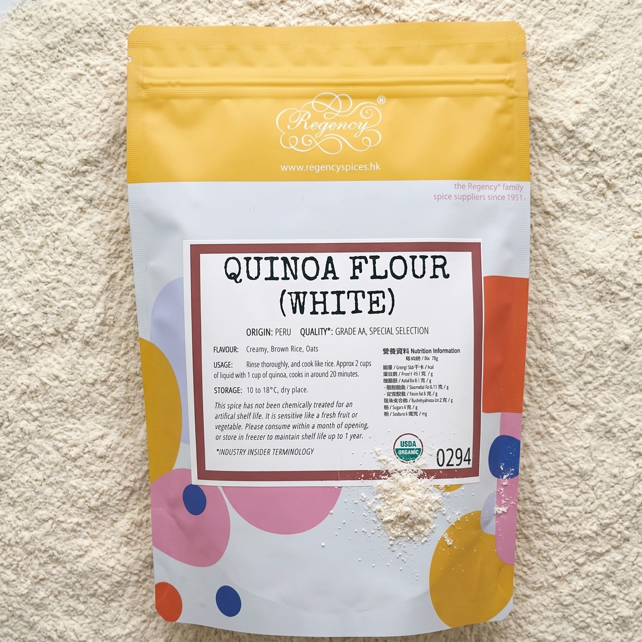 Organic White Quinoa Flour Regency packaging on bed of organic white quinoa flour