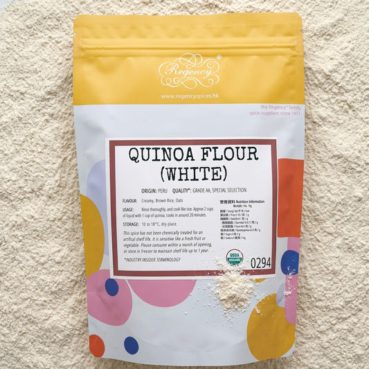 Organic White Quinoa Flour Regency packaging on bed of organic white quinoa flour