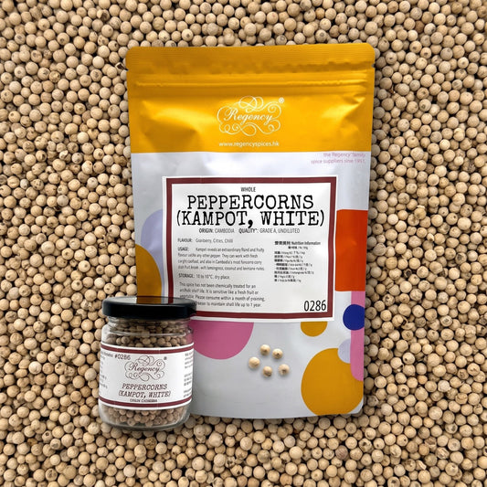 Peppercorns (KAMPOT, White) Regency packaging on bed of peppercorns
