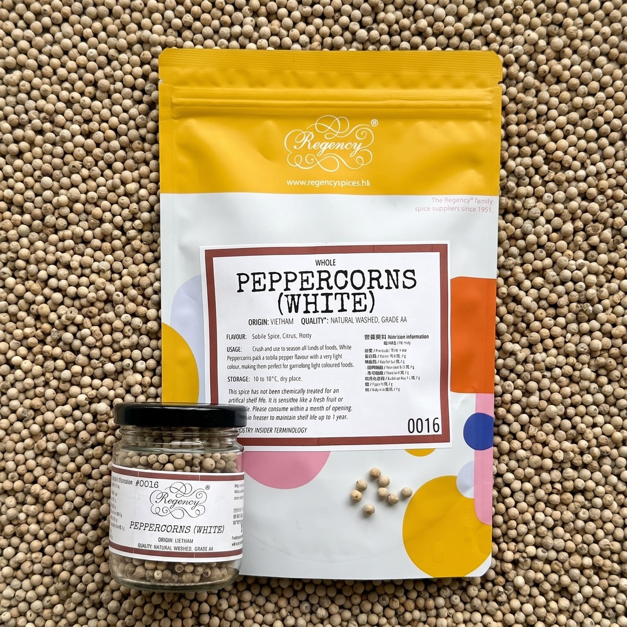 Peppercorns (White) Regency packaging on bed of peppercorns