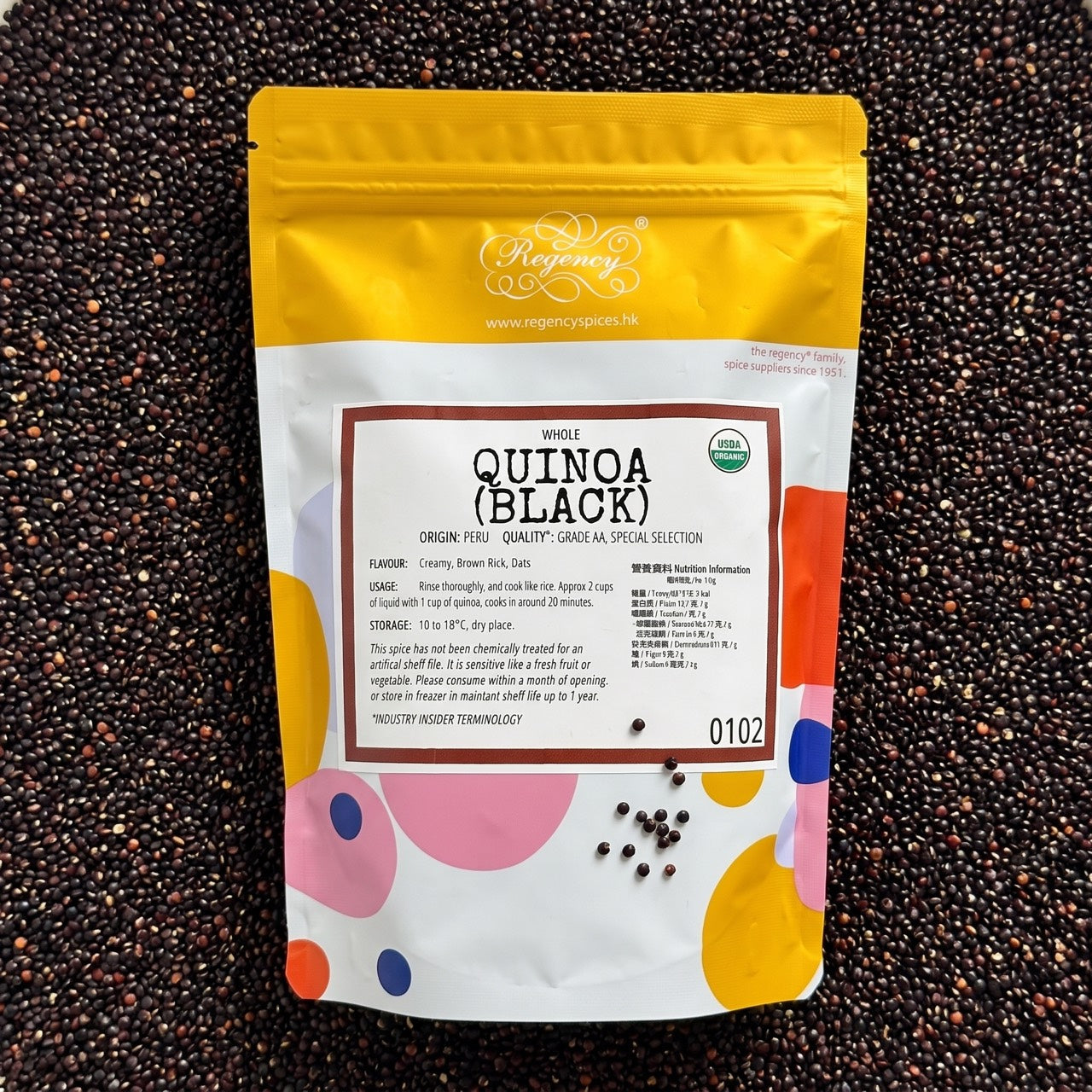 Quinoa (Black, ORGANIC) Regency packaging on bed of quinoa