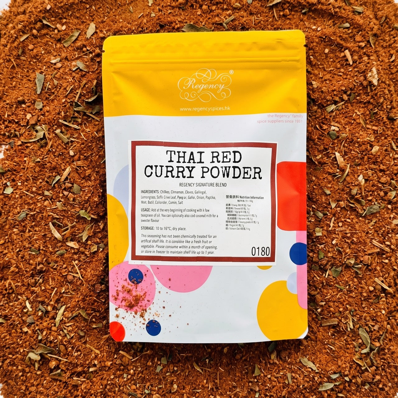 Thai Red Curry Powder Regency packaging on bed of thai red curry powder